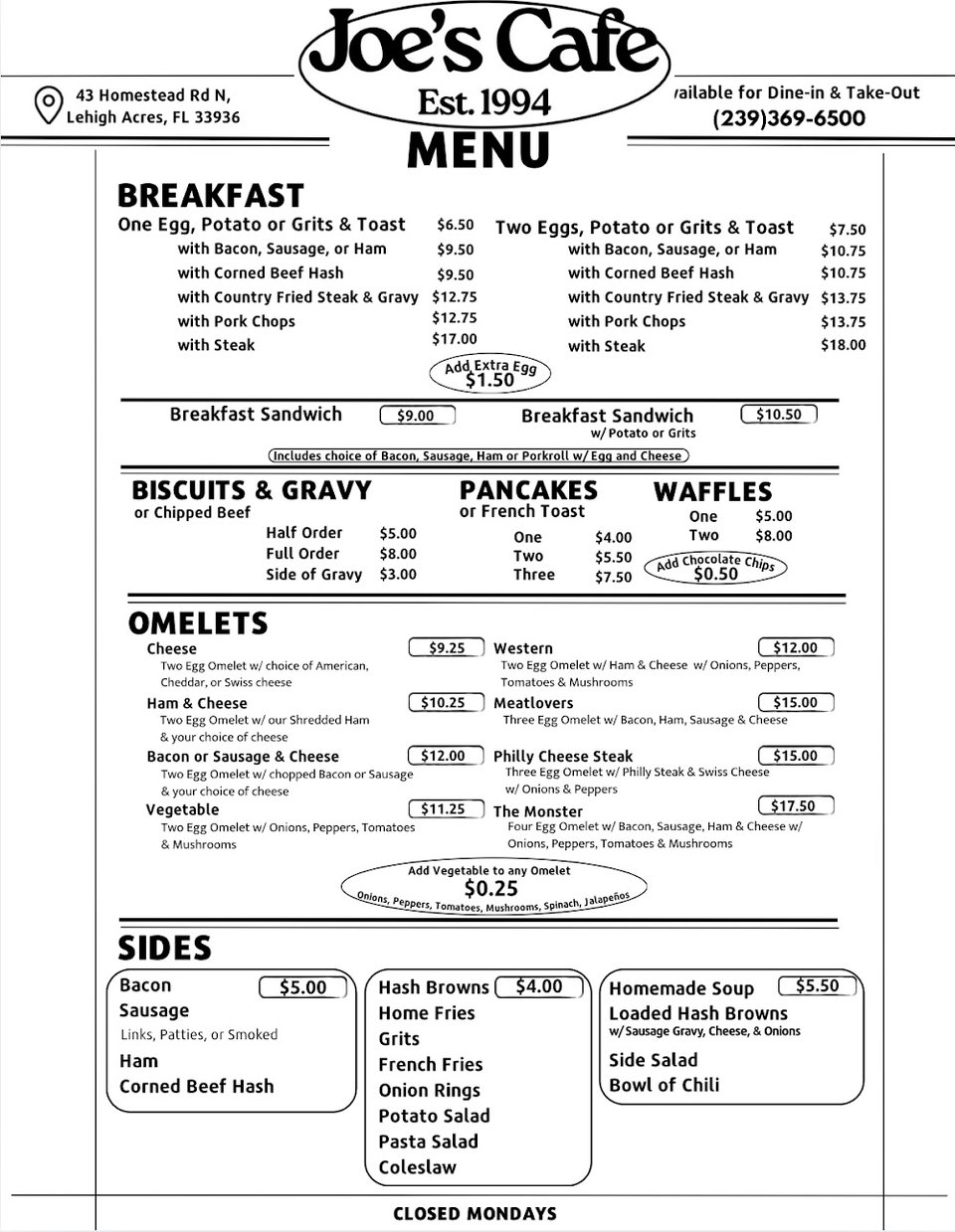 Printed cafe menu showing hearty breakfast plates.